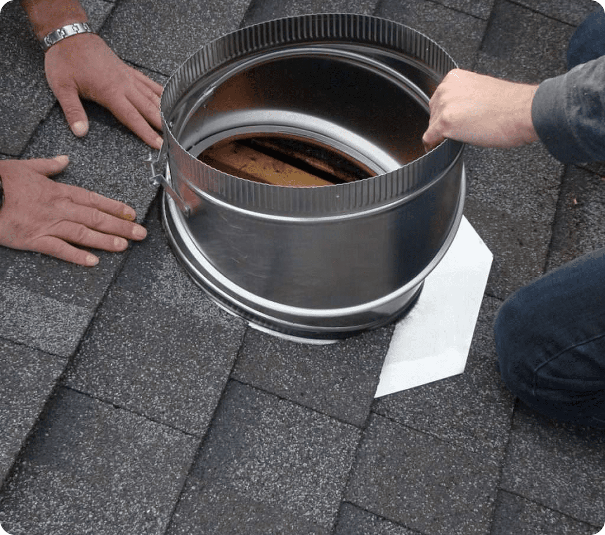 Hands working on roof vent setup